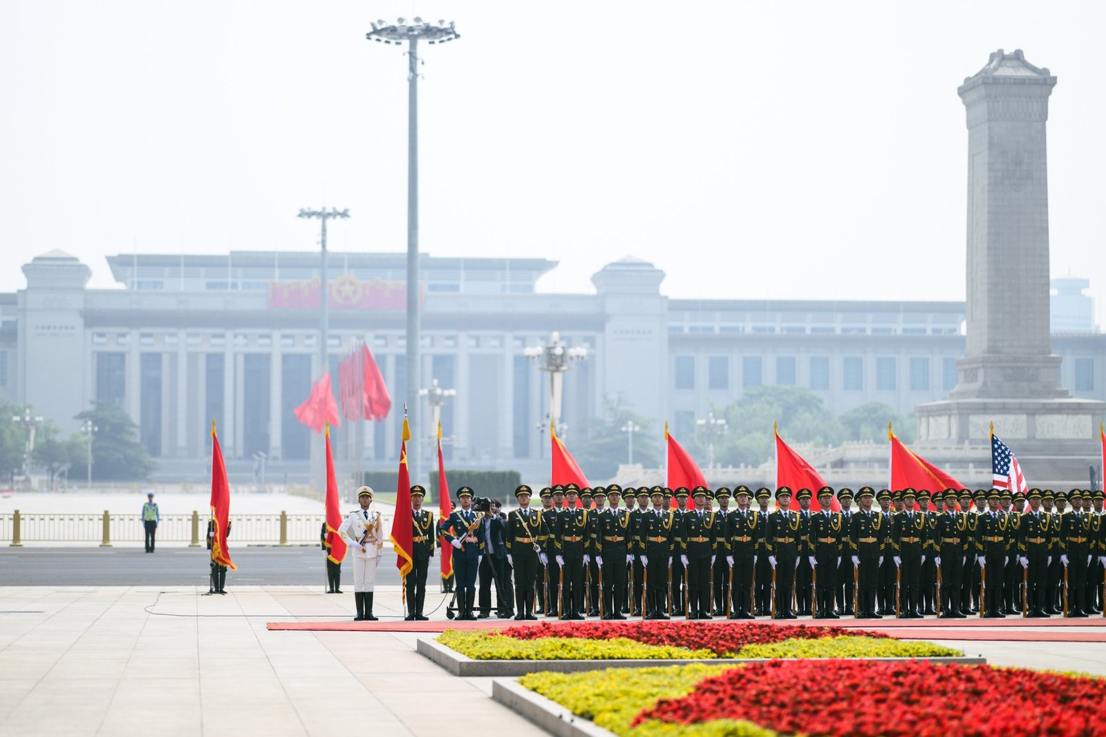 Honor guard with Chinese and U.S. flags in Tiananmen Square, Beijing, May 2026