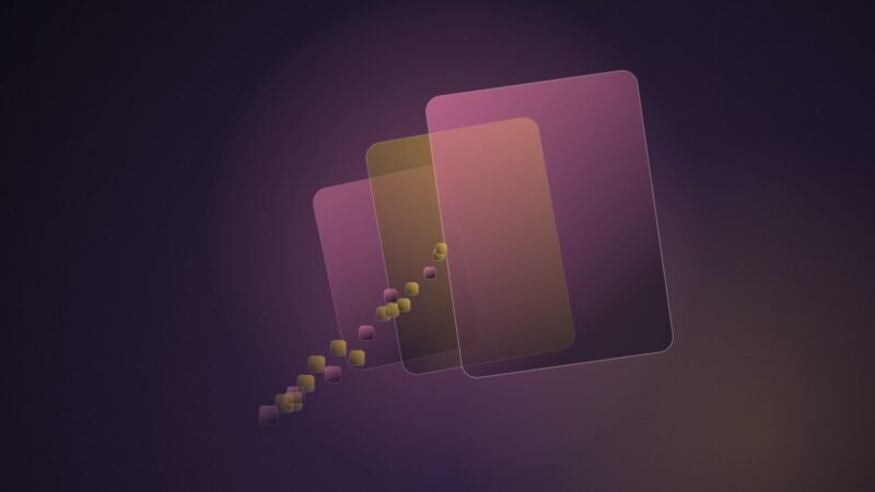 Abstract illustration of three tilted rounded panels of increasing size stacked in depth, with a stream of small square tiles flowing into them, in pink and yellow on a dark purple background.