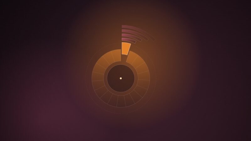 Abstract illustration of a small segment split from a large ring, with stepped arcs widening outward in orange and pink on a dark wine background