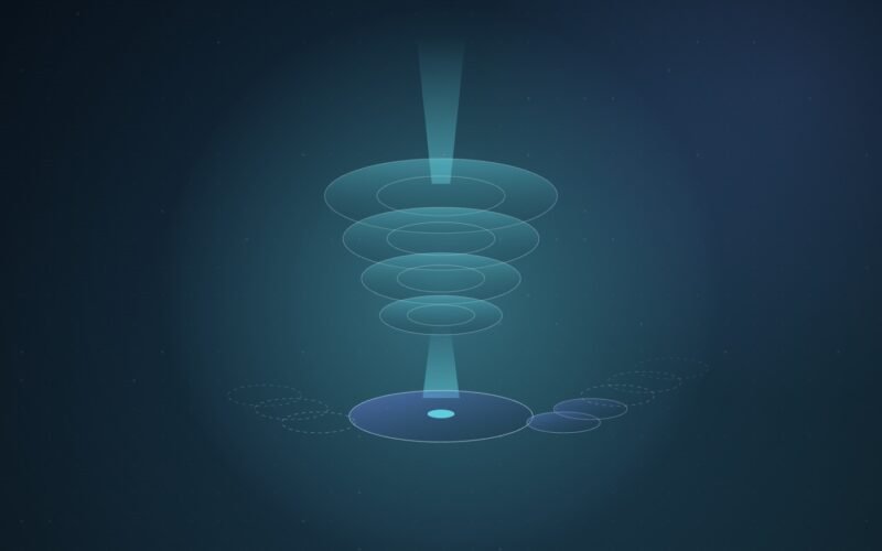 Abstract illustration of a narrow beam of light passing through a stack of glowing lens rings onto a wafer disc, with dashed outline wafers queued on either side, on a deep blue background