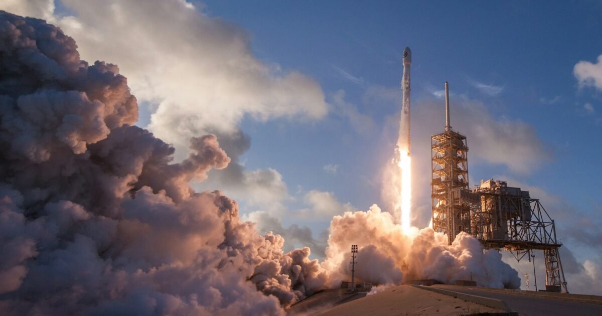 A SpaceX Falcon 9 rocket climbing on a column of flame and exhaust (file photo).