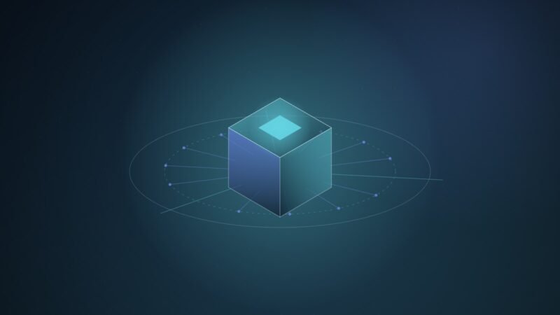 Abstract illustration of a translucent teal and blue isometric cube with a glowing top panel, ringed by a dashed perimeter that stops most outward lines.