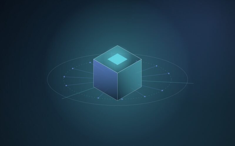 Abstract illustration of a translucent teal and blue isometric cube with a glowing top panel, ringed by a dashed perimeter that stops most outward lines.
