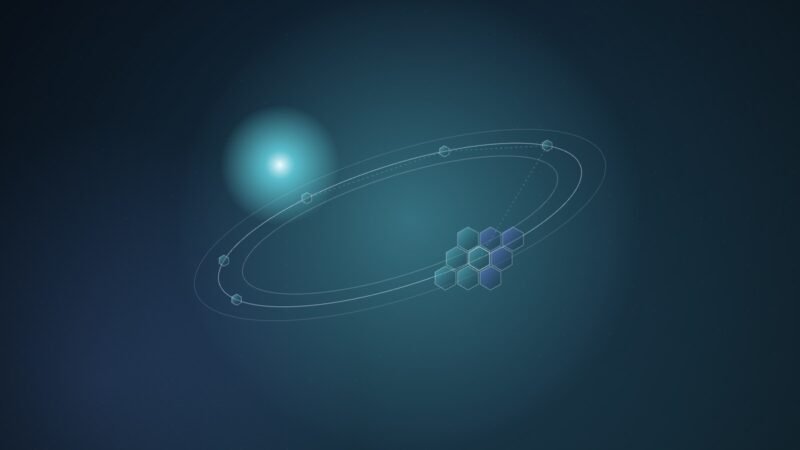 Abstract illustration of a cluster of small hexagonal chip tiles orbiting along a tilted ring past a bright sun-like glow, in cyan and blue
