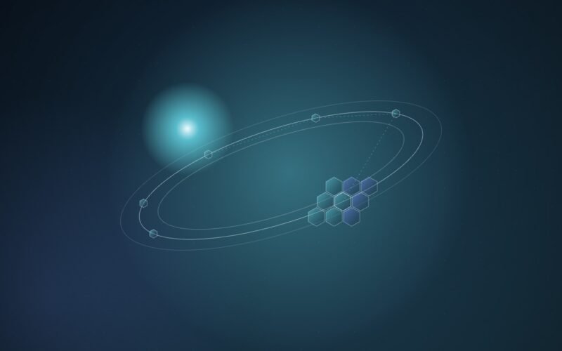 Abstract illustration of a cluster of small hexagonal chip tiles orbiting along a tilted ring past a bright sun-like glow, in cyan and blue