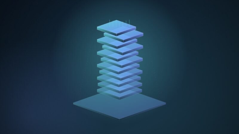 Abstract illustration of a tall stack of glowing cyan and blue memory wafers rising above a thin, dim slab on a dark blue field