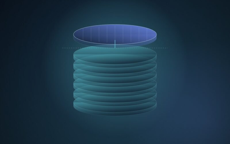 Abstract illustration of a stack of glowing cyan and blue wafer discs rising in steps, the top disc lifting clear of a thin horizontal guide line, on a deep navy gradient